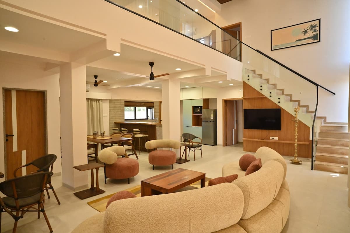 Aurai Villa exterior with pool and sea view in Dapoli