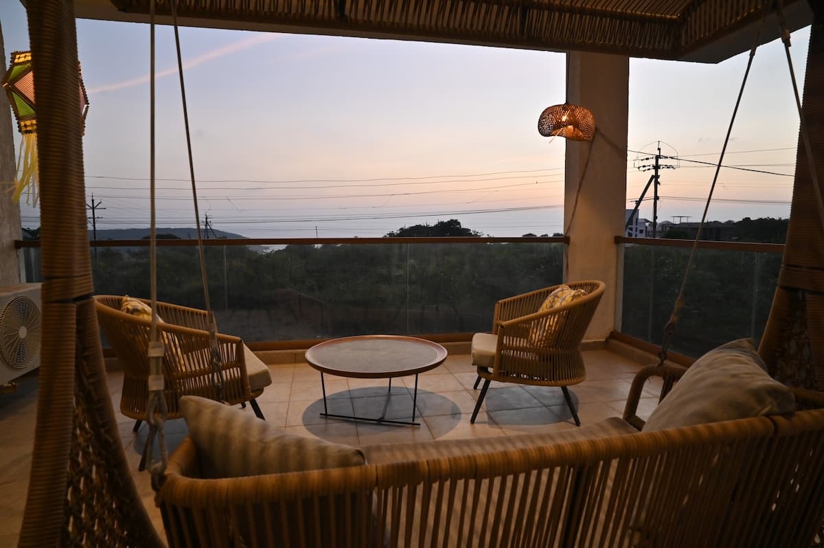 Sea view from Aurai Villa balcony at sunrise